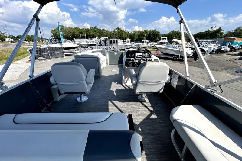 Slide: The Image of Interior view of 2025 Godfrey Sweetwater 2286 SFL pontoon boat with plush seating. - 68