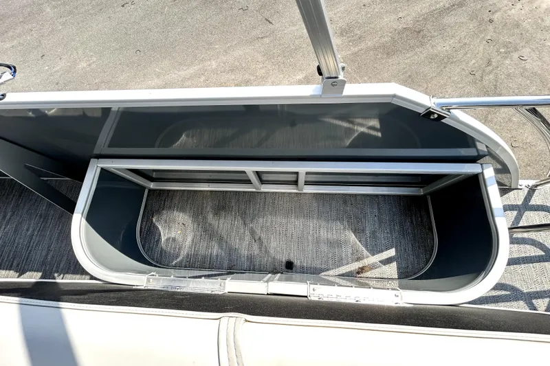 Slide: The Image of Storage compartment on 2025 Godfrey Sweetwater 2286 SFL pontoon boat, featuring durable construction. - 75