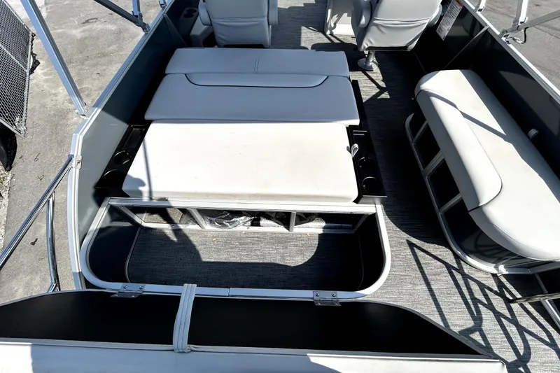 Slide: The Image of 2025 Godfrey Sweetwater 2286 SFL pontoon boat interior with seating and storage. - 76