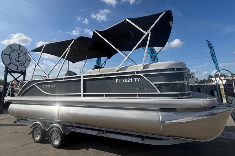 The Image of 2025 Godfrey Sweetwater 2286 SFL pontoon boat on trailer. - 0