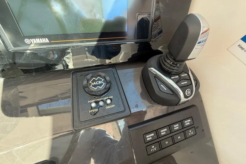 Slide: The Image of Control panel of 2022 Pursuit DC 326 Dual Console with Yamaha joystick and ACR system. - 28