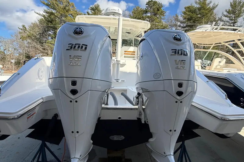 Slide: The Image of 2022 Pursuit DC 326 Dual Console with twin Yamaha 300 V6 outboard engines. - 5