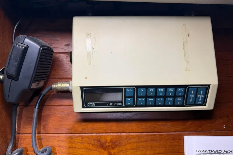 Slide: The Image of VHF 7000 radio system with microphone on a C&C 35 MK III, 1985 model. - 24