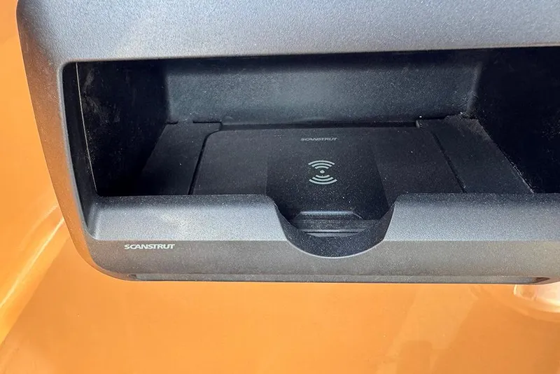 Slide: The Image of Wireless charging station on 2026 Bentley Pontoons 253 Elite Swingback DC. - 36