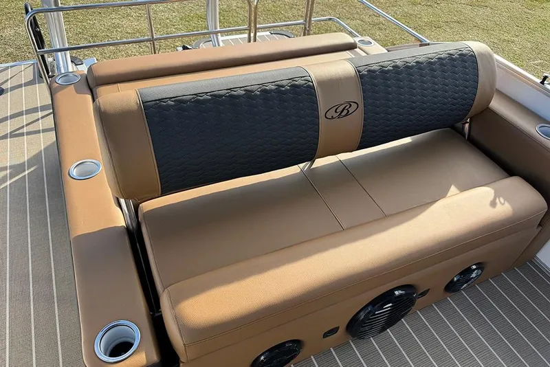 Slide: The Image of Luxurious seating on 2026 Bentley Pontoons 253 Elite Swingback DC with cup holders and speakers. - 40