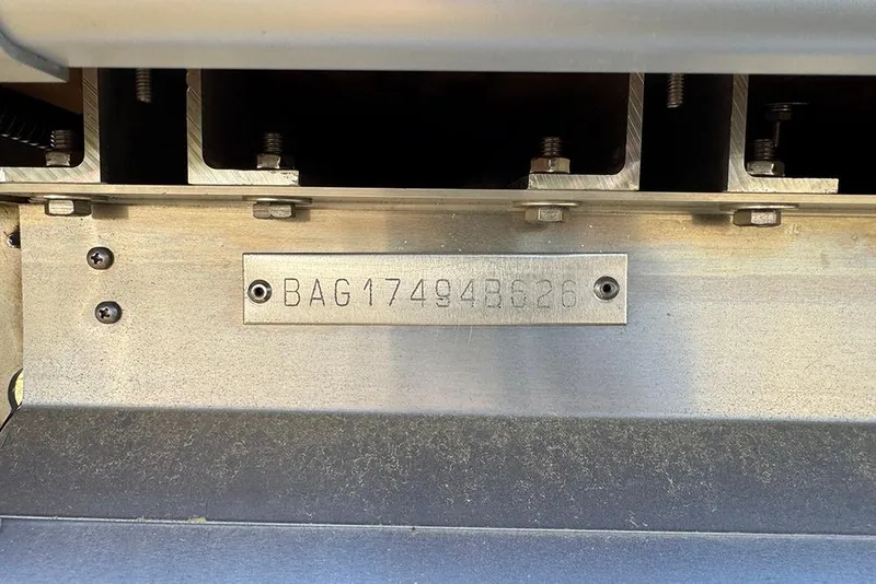 Slide: The Image of 2026 Bentley Pontoons 253 Elite Swingback DC hull identification number plate. - 50