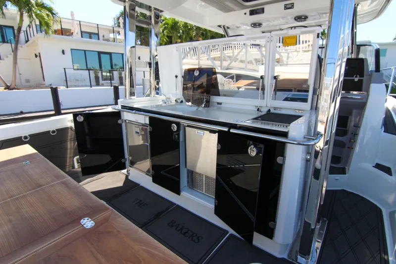 Slide: The Image of 2021 Jeanneau Leader 12.5 WA yacht interior with sleek kitchen and modern design. - 15