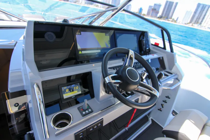 Slide: The Image of Cockpit of 2021 Jeanneau Leader 12.5 WA with modern navigation equipment. - 18