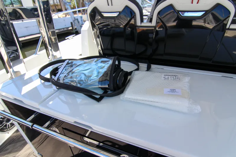 Slide: The Image of Jeanneau Leader 12.5 WA 2021 boat interior with accessories on white surface. - 25