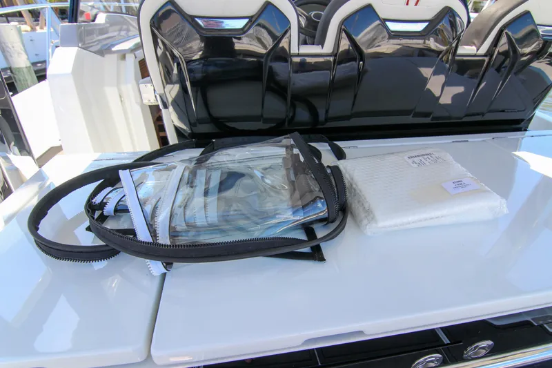 Slide: The Image of 2021 Jeanneau Leader 12.5 WA cockpit with accessories on white surface. - 26