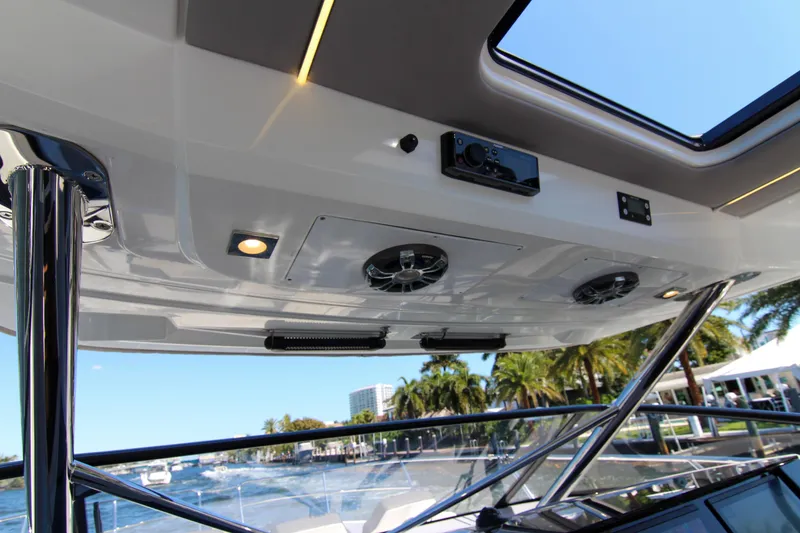 Slide: The Image of 2021 Jeanneau Leader 12.5 WA boat interior with speakers and lighting. - 37