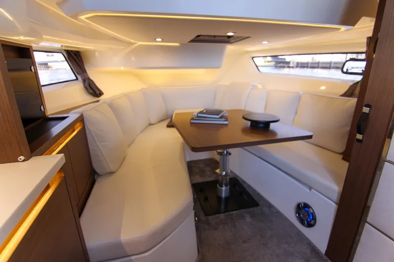 Slide: The Image of Luxurious interior of 2021 Jeanneau Leader 12.5 WA with elegant seating and modern decor. - 41
