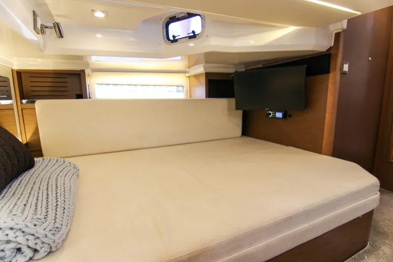 Slide: The Image of Interior cabin of 2021 Jeanneau Leader 12.5 WA with bed and TV. - 50