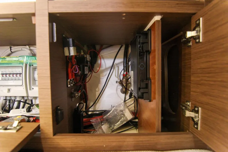 Slide: The Image of Electrical panel inside a 2021 Jeanneau Leader 12.5 WA boat cabinet. - 57