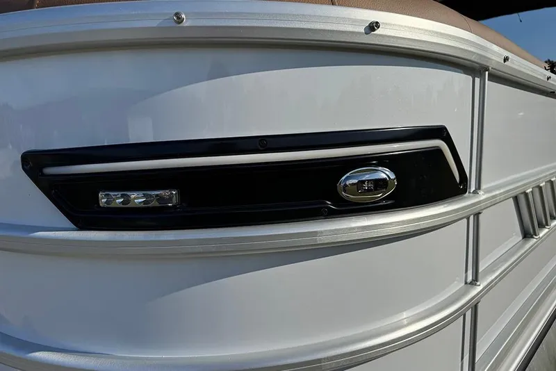 Slide: The Image of 2026 Bentley Pontoons Elite 253 Admiral, sleek exterior detail with modern lighting. - 12