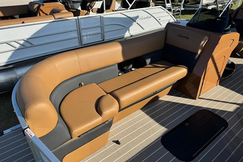 Slide: The Image of 2026 Bentley Pontoons Elite 253 Admiral with luxurious tan seating and sleek design. - 20