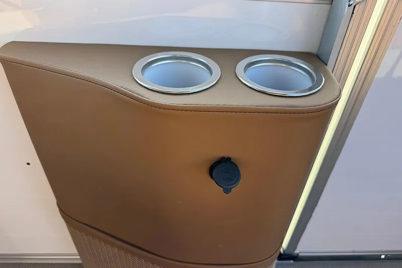 Slide: The Image of Cup holders and USB port on 2026 Bentley Pontoons Elite 253 Admiral. - 33