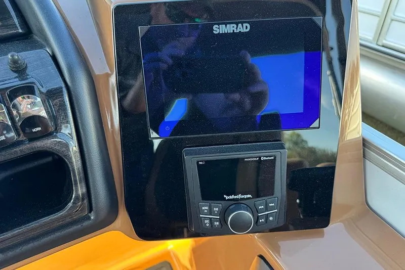 Slide: The Image of Dashboard of 2026 Bentley Pontoons Elite 253 Admiral with Simrad display. - 38