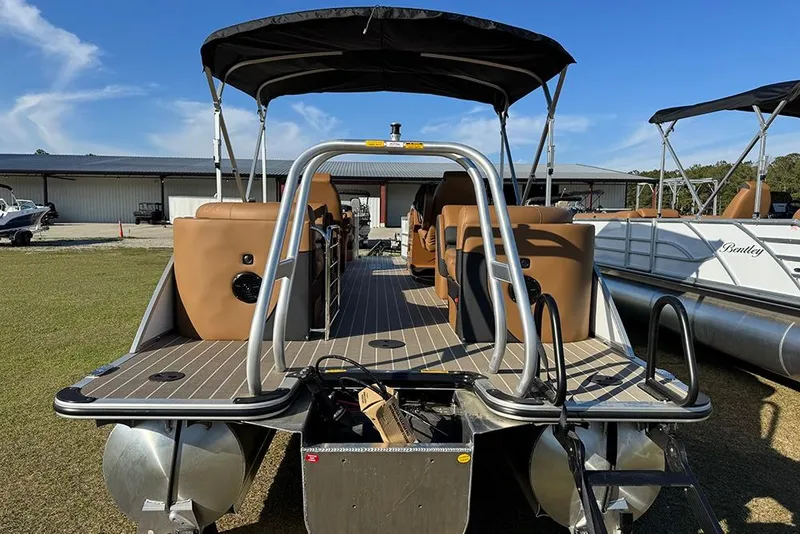 Slide: The Image of 2026 Bentley Pontoons Elite 253 Admiral pontoon boat with sleek design and spacious seating. - 4