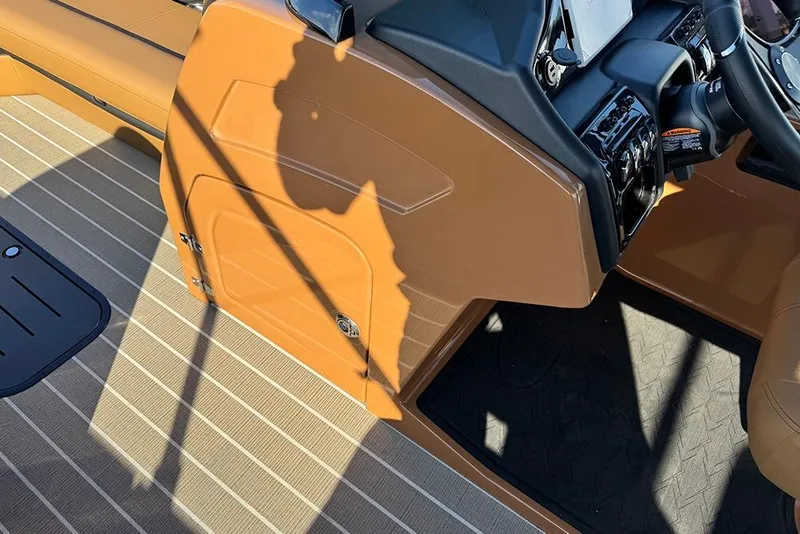Slide: The Image of 2026 Bentley Pontoons Elite 253 Admiral interior with tan and black accents. - 41