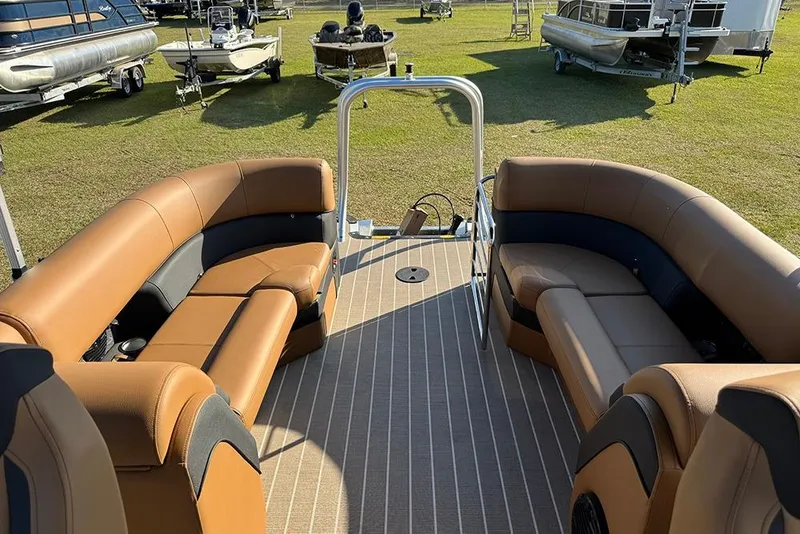 Slide: The Image of 2026 Bentley Pontoons Elite 253 Admiral with luxurious seating on display outdoors. - 45
