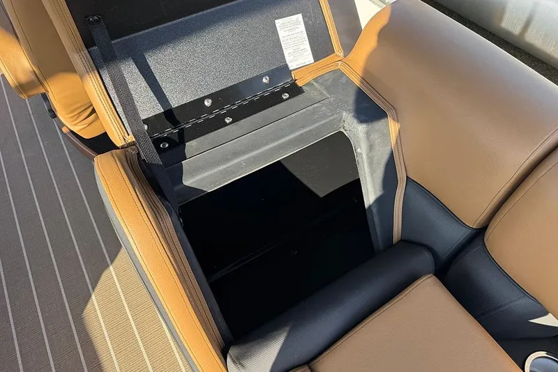 Slide: The Image of Open storage compartment in 2026 Bentley Pontoons Elite 253 Admiral boat seat. - 48