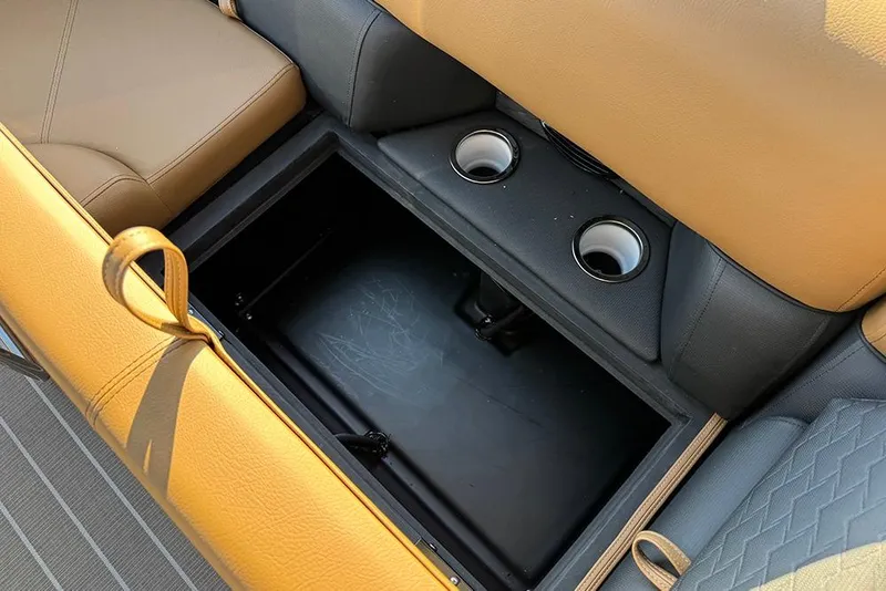 Slide: The Image of Interior storage compartment of 2026 Bentley Pontoons Elite 253 Admiral with cup holders. - 52
