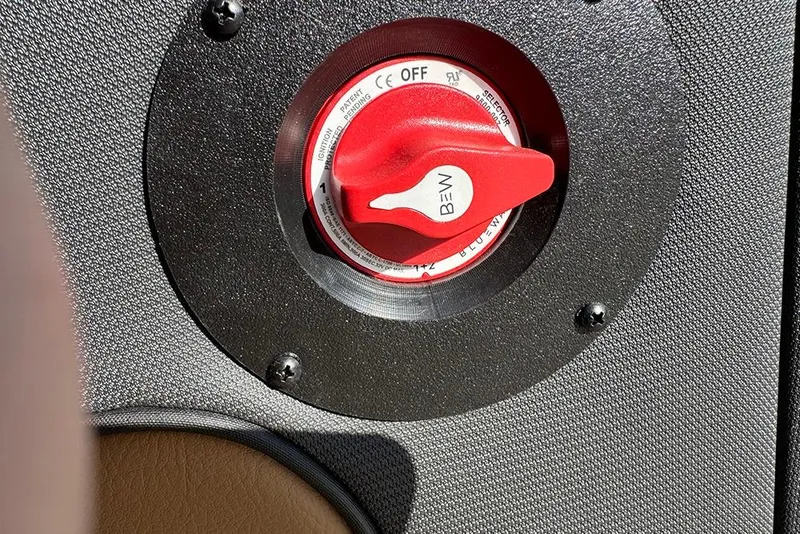 Slide: The Image of Red switch on Bentley Pontoons Elite 253 Admiral, 2026 model, with textured panel background. - 54