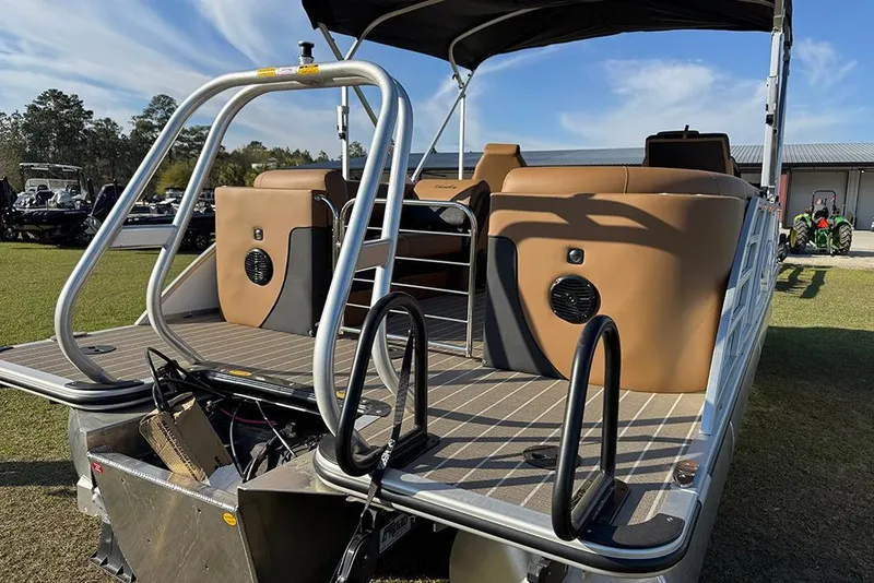 Slide: The Image of 2026 Bentley Pontoons Elite 253 Admiral with tan seating and sleek design. - 58