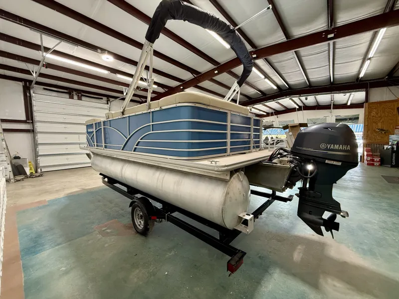 Slide: The Image of 2017 Sylvan 8520 pontoon boat with Yamaha motor in warehouse. - 7