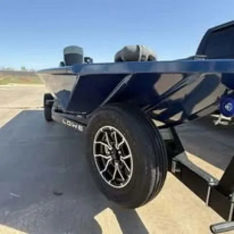 Slide: The Image of 2025 Lowe Stinger 195C boat on trailer, side view. - 3