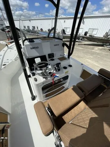 Slide: The Image of Interior view of 2023 Sea Pro 248 Bay Series boat with modern features. - 13