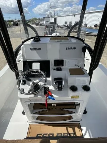 Slide: The Image of 2023 Sea Pro 248 Bay Series boat console with Simrad electronics. - 14