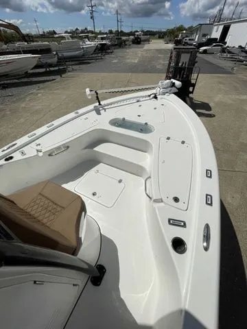 Slide: The Image of 2023 Sea Pro 248 Bay Series boat on a parking lot. - 22