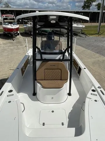 Slide: The Image of 2023 Sea Pro 248 Bay Series boat in harbor. - 25