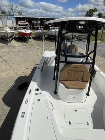 Slide: The Image of 2023 Sea Pro 248 Bay Series boat in a parking lot. - 26