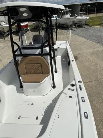 Slide: The Image of 2023 Sea Pro 248 Bay Series boat on a parking lot. - 27