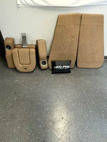 Slide: The Image of Beige cushions for 2023 Sea Pro 248 Bay Series on gray floor. - 29