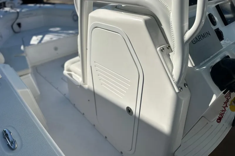 Slide: The Image of 2020 Everglades 243 Center Console boat interior with Garmin equipment. - 19