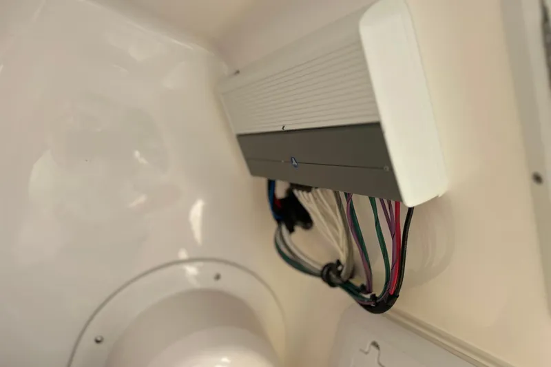 Slide: The Image of Electrical wiring inside a 2020 Everglades 243 Center Console boat. - 21