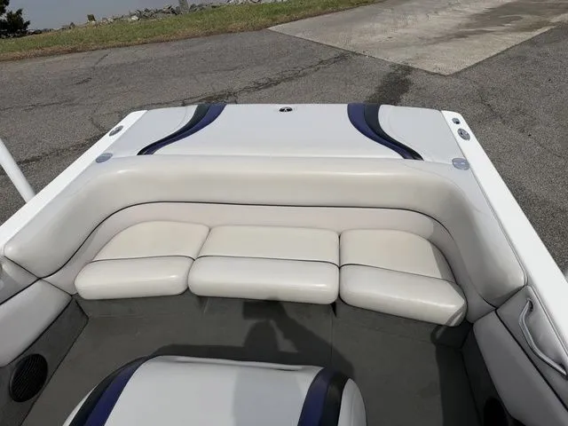 Slide: The Image of Interior of a 2000 Malibu Sunsetter LXi boat with white seating. - 3