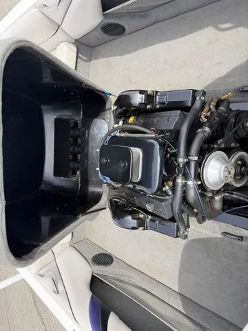 Slide: The Image of Engine compartment of a 2000 Malibu Sunsetter LXi boat. - 4
