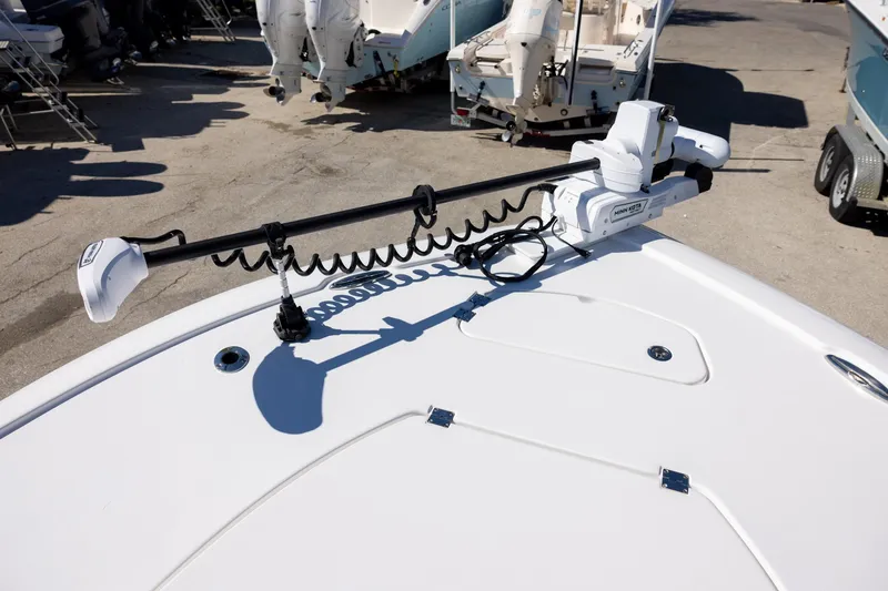Slide: The Image of 2025 Tidewater 2500 Carolina Bay boat with Minn Kota trolling motor on deck. - 15