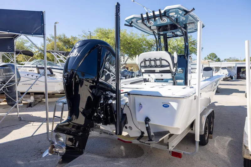 Slide: The Image of 2025 Tidewater 2500 Carolina Bay boat with Yamaha engine on trailer. - 4