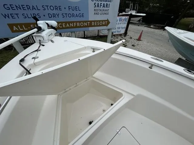 Slide: The Image of 2016 Bulls Bay 230 Center Console with open storage compartment. - 5