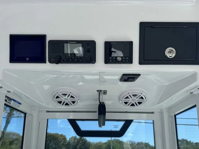 Slide: The Image of Interior view of 2026 Wellcraft Fisherman 243 XB with electronics. - 10