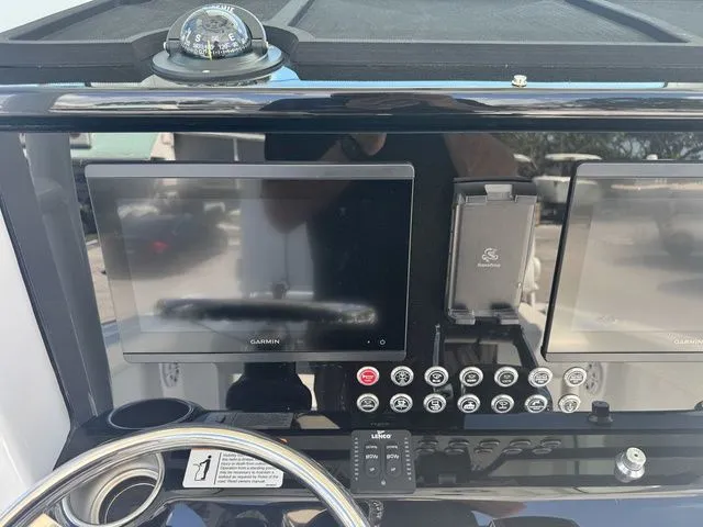 Slide: The Image of Dashboard of 2026 Wellcraft Fisherman 243 XB with Garmin screens. - 13
