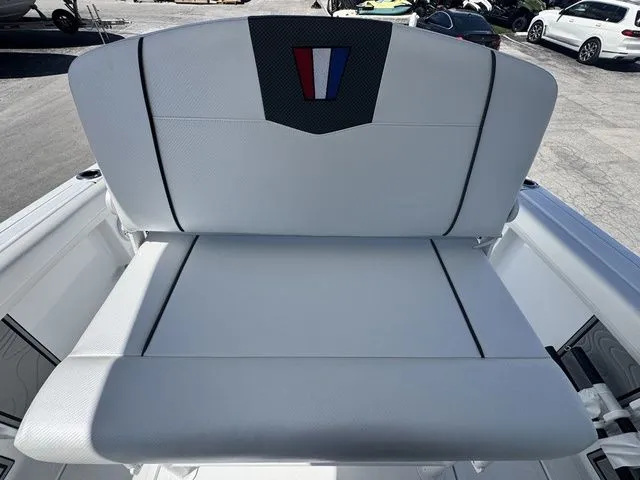 Slide: The Image of 2026 Wellcraft Fisherman 243 XB rear seat with modern design. - 15