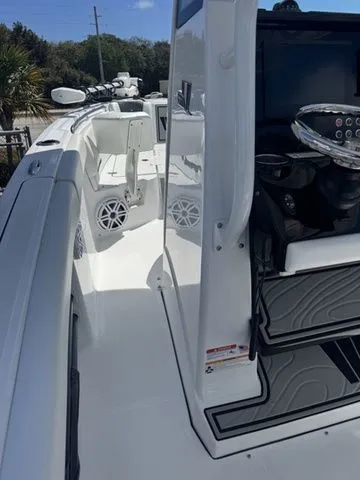 Slide: The Image of 2026 Wellcraft Fisherman 243 XB boat, modern design, white interior. - 23