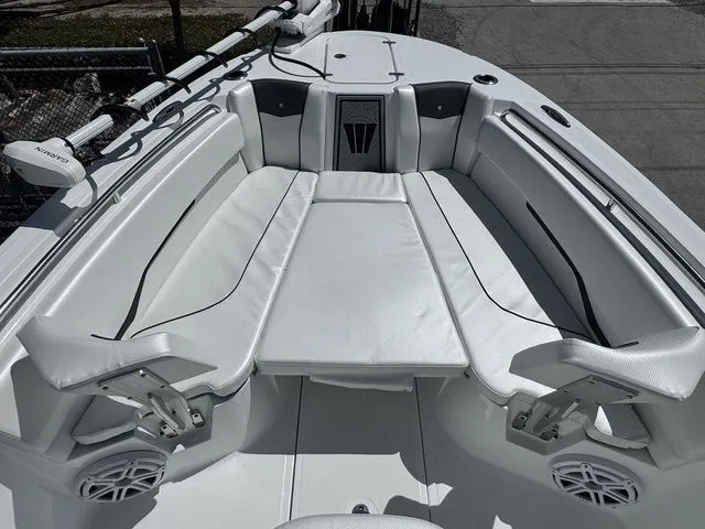 Slide: The Image of Interior view of 2026 Wellcraft Fisherman 243 XB with white upholstery. - 25